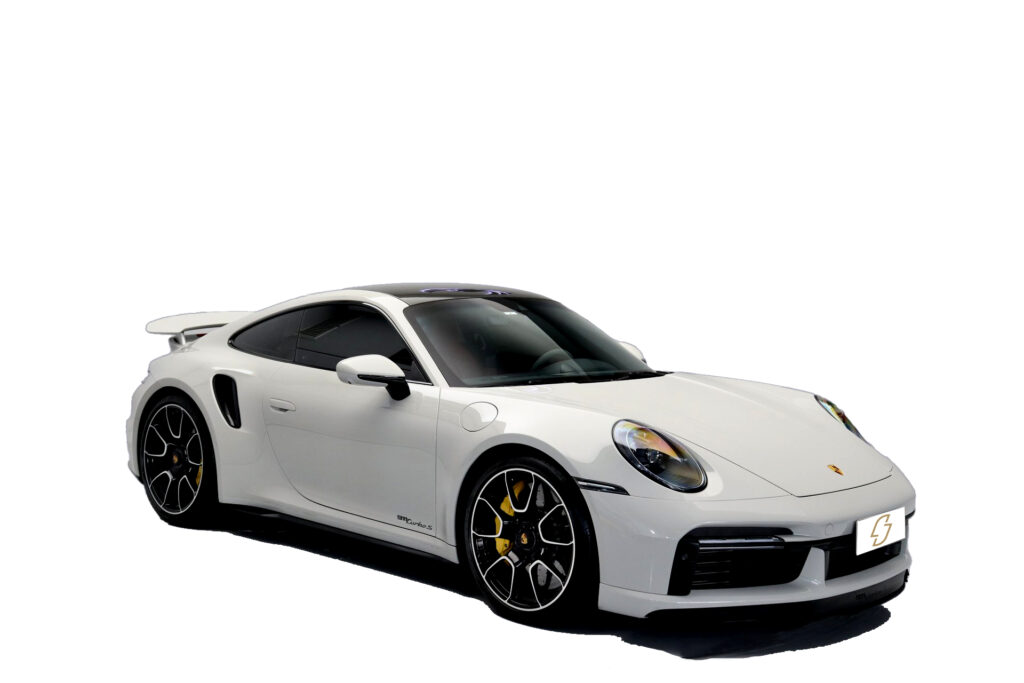 Porsche 911 Carrera 2024 in sleek silver, a high-performance sports coupe with 379 horsepower, 4.0 seconds acceleration from 0-60 mph, top speed of 182 mph, available for luxury rental in Dubai by Smart Move Dubai